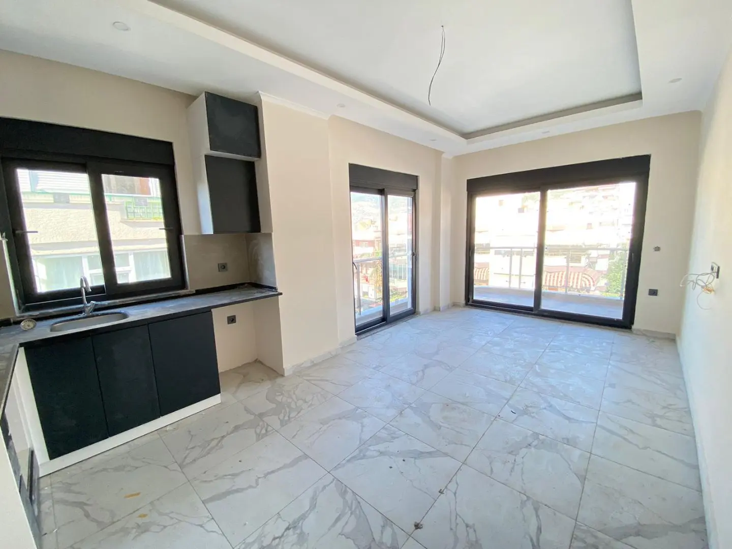 1+1 UNFURNISHED FLAT IN THE CENTER OF ALANYA